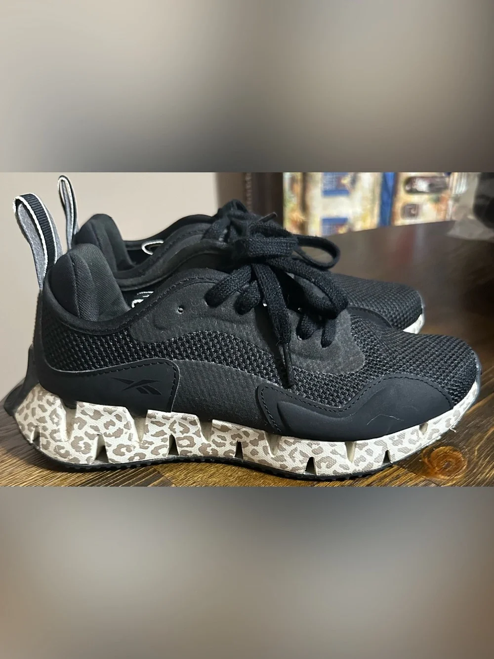 Reebok Black Athletic Sneakers with Leopard-Print Sole
